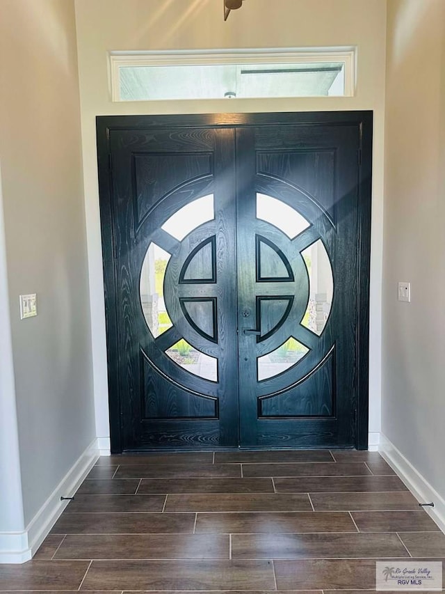 3617 Mattie Ln, Harlingen, TX 78550 - entryway with wood finished floors and baseboards