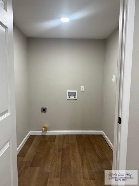 clothes washing area featuring laundry area, baseboards, dark wood-style flooring, hookup for a washing machine, and electric dryer hookup