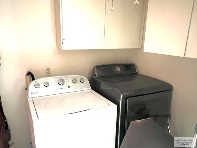 12 Palmetto Ct, Brownsville, TX 78521 - laundry area with separate washer and dryer and cabinet space