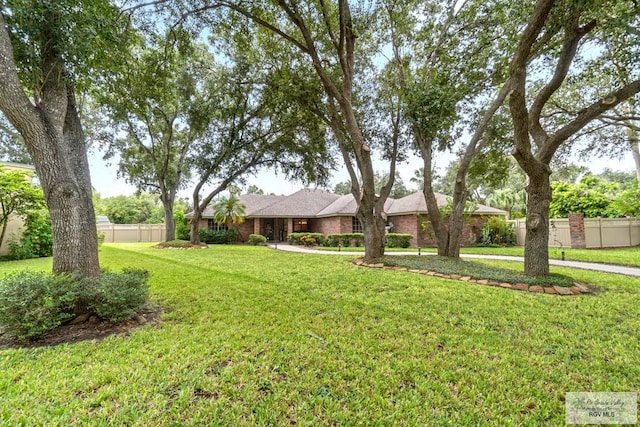 24382 Preston Trl, Harlingen, TX 78552 - single story home featuring brick siding