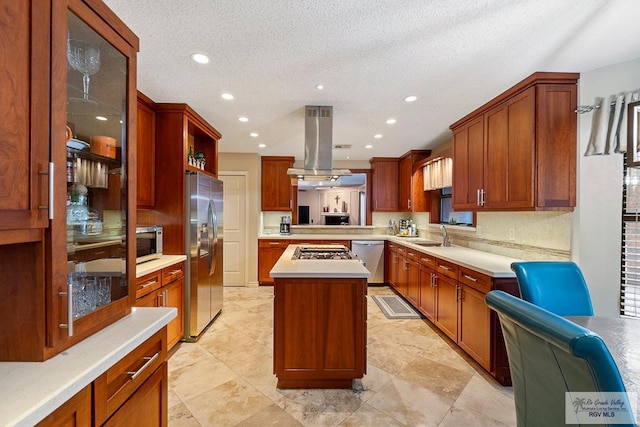 24382 Preston Trl, Harlingen, TX 78552 - kitchen featuring island range hood, appliances with stainless steel finishes, recessed lighting, a kitchen island, and light countertops