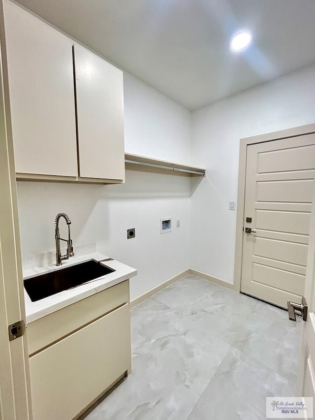 514 Oriole Dr, Los Fresnos, TX 78566 - laundry room featuring hookup for an electric dryer, cabinet space, washer hookup, light marble finish floors, and recessed lighting