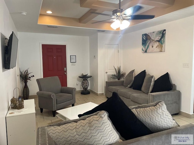 tiled living room featuring ceiling fan