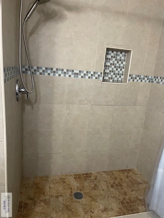 bathroom with walk in shower