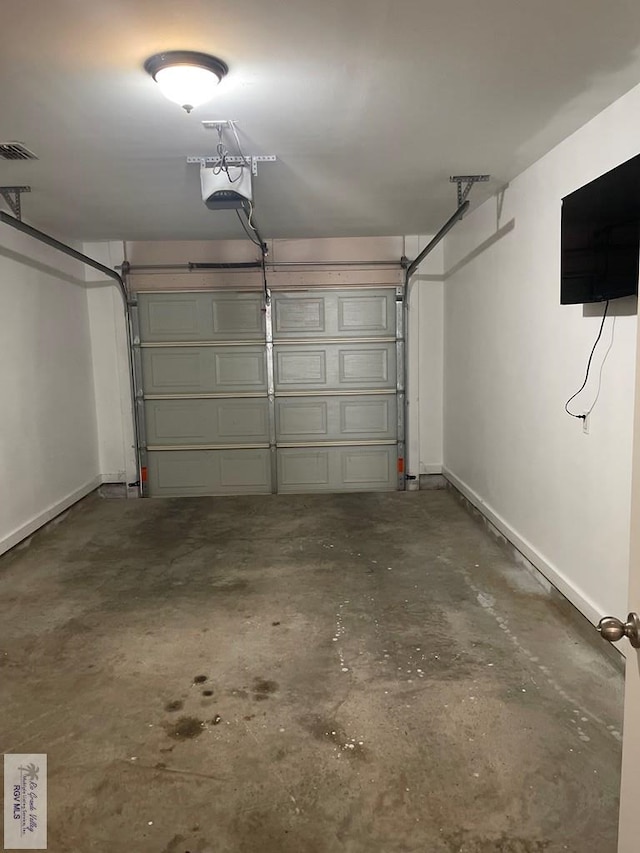 garage with a garage door opener