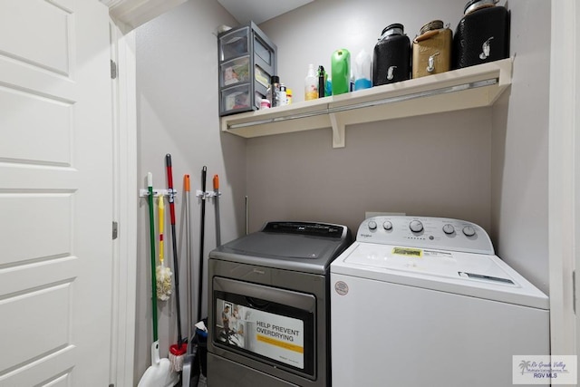 laundry room featuring separate washer and dryer