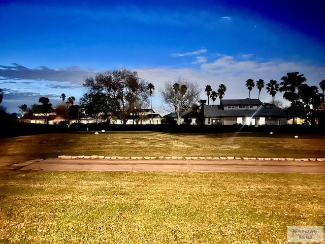 view of community with a lawn