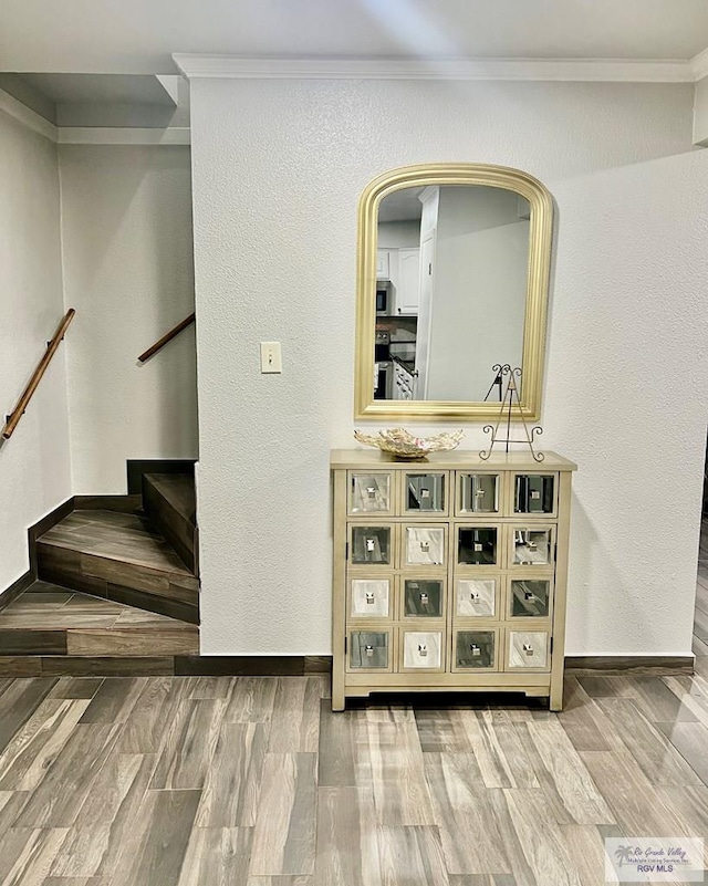 bar featuring range and crown molding