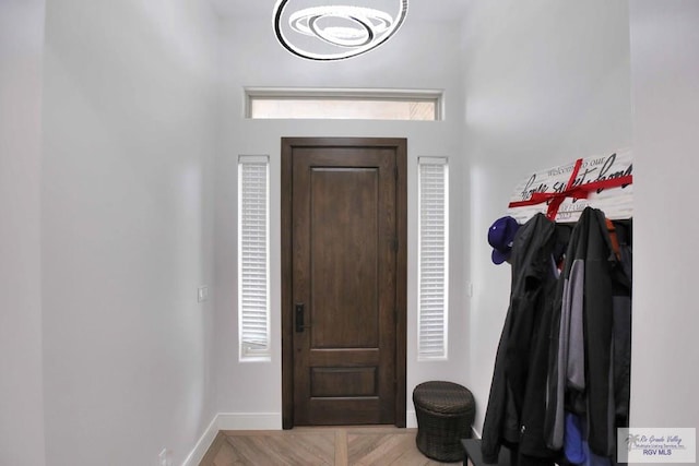 entryway with light hardwood / wood-style floors