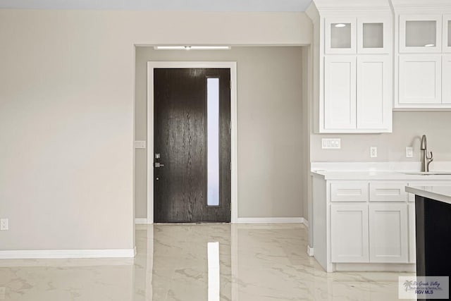 foyer entrance featuring sink