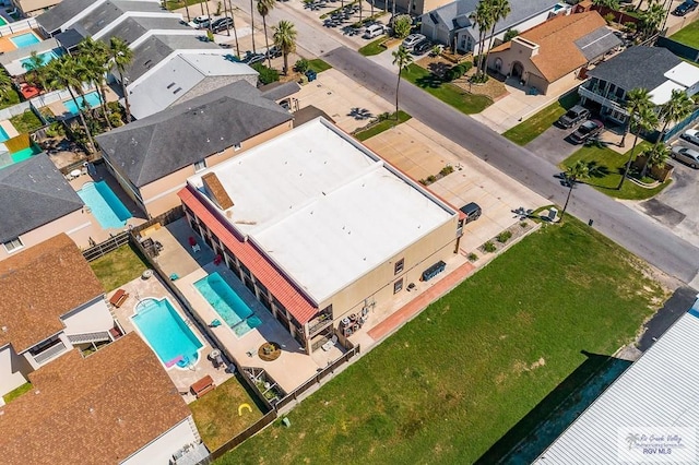 106 E Campeche St Unit A2, South Padre Island, TX 78597 - aerial perspective of suburban area with a pool
