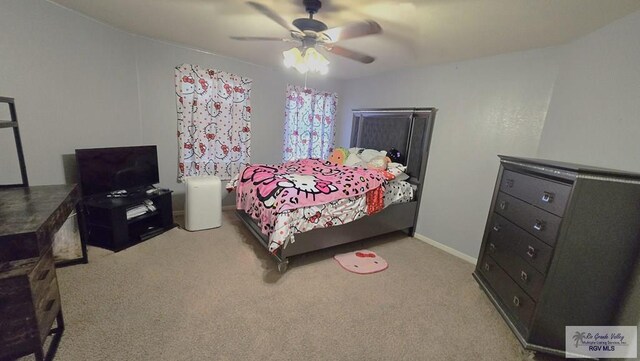 bedroom featuring ceiling fan and light carpet