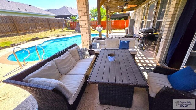 view of patio featuring an outdoor living space, a fenced in pool, ceiling fan, and a grill