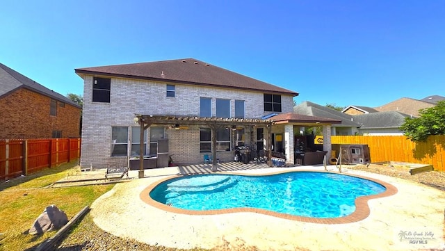 view of swimming pool with a pergola and a patio