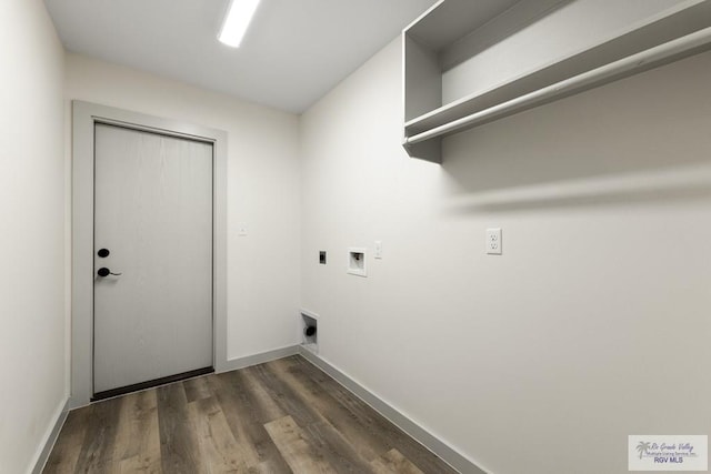 laundry area featuring electric dryer hookup, hookup for a washing machine, and dark wood-type flooring