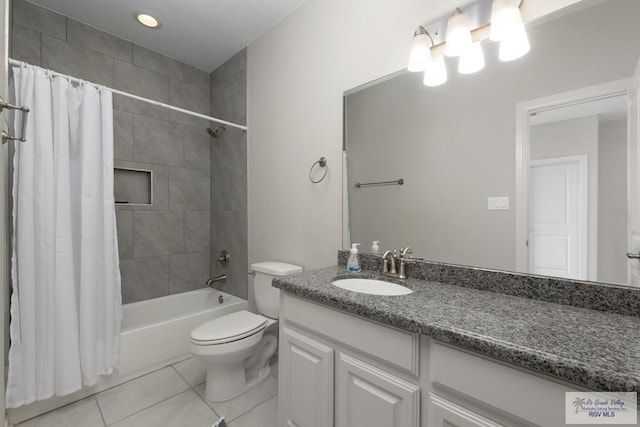 full bath featuring toilet, shower / tub combo, tile patterned flooring, and vanity