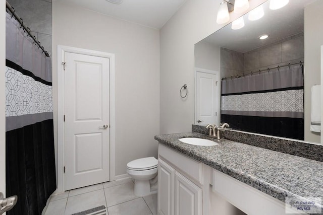 full bathroom featuring toilet, a shower with shower curtain, tile patterned flooring, and vanity