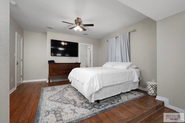 bedroom featuring hardwood / wood-style flooring and ceiling fan