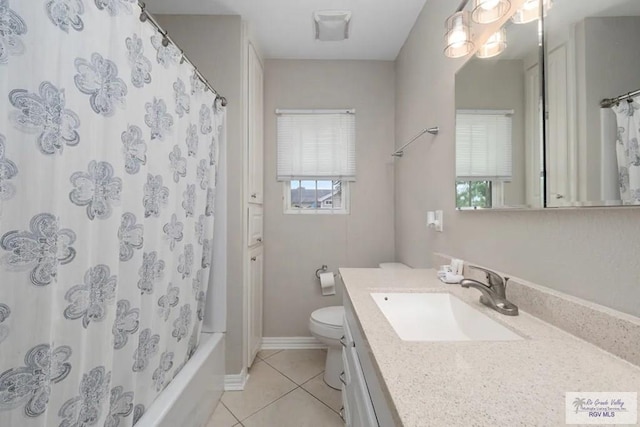 full bathroom with vanity, tile patterned floors, toilet, and shower / tub combo with curtain