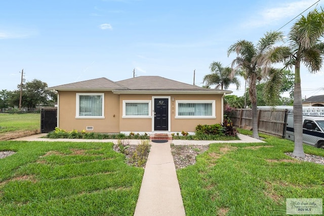 view of front of home with a front yard