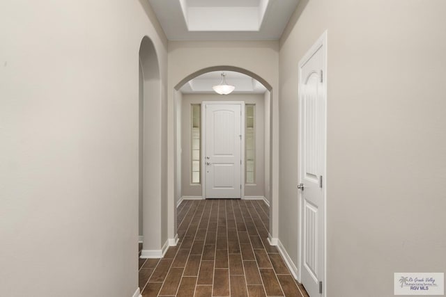 hall with dark hardwood / wood-style flooring