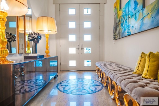 entrance foyer featuring french doors