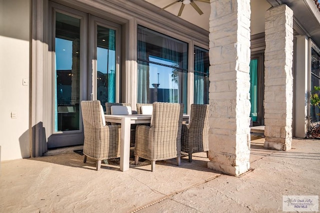 view of patio featuring ceiling fan