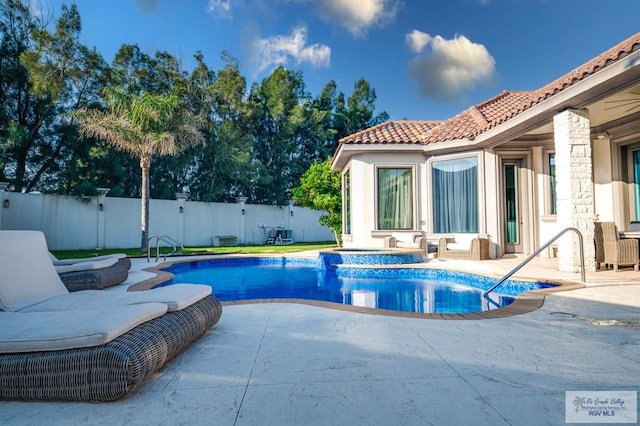 view of pool with a patio