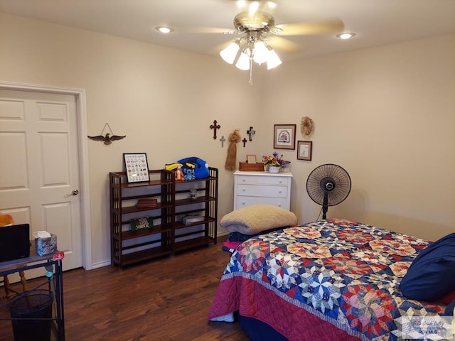 bedroom featuring ceiling fan and dark hardwood / wood-style flooring