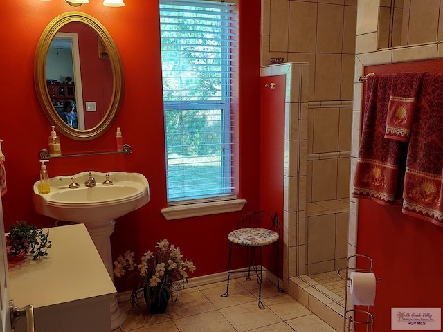 bathroom featuring tile patterned flooring and plenty of natural light