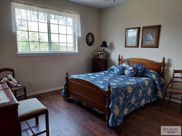 bedroom featuring dark hardwood / wood-style floors