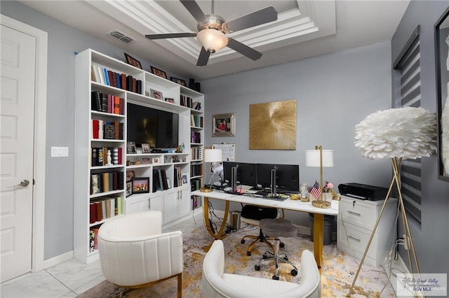 office space with light marble finish flooring and a ceiling fan