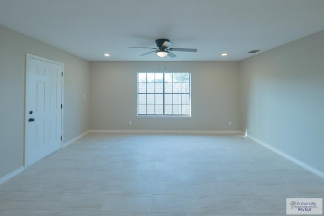 spare room featuring recessed lighting, baseboards, and a ceiling fan