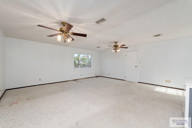 unfurnished room featuring ceiling fan