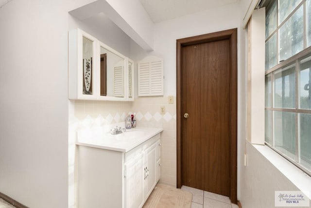 bathroom featuring tile patterned floors and vanity