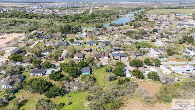 aerial view with a residential view and a water view