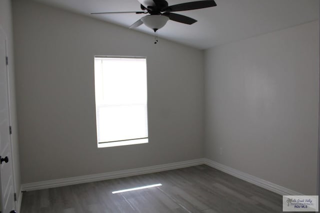 unfurnished room with ceiling fan and wood-type flooring