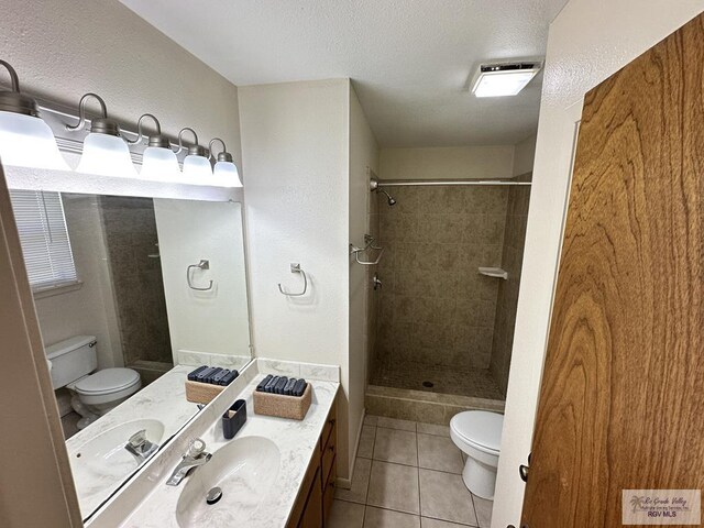 kitchen with light tile patterned floors, white appliances, and sink