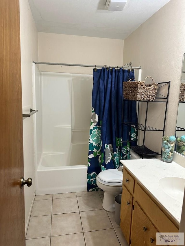 full bathroom with tile patterned flooring, vanity, shower / bath combination with curtain, and toilet