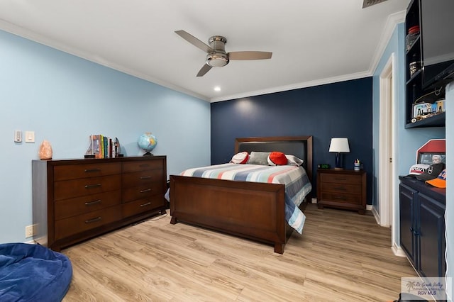 bedroom with light wood-type flooring, ceiling fan, and crown molding