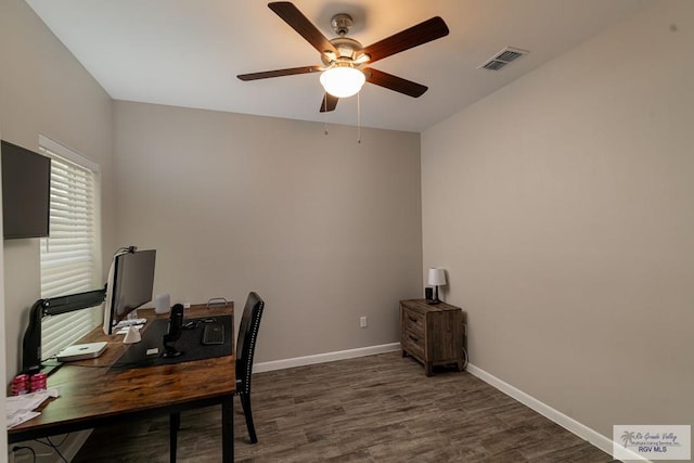 office space with dark hardwood / wood-style floors and ceiling fan