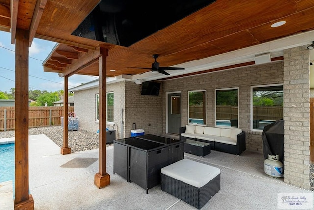 view of patio / terrace with outdoor lounge area and ceiling fan