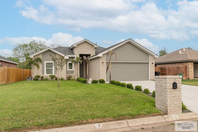 view of front facade with a front lawn and a garage