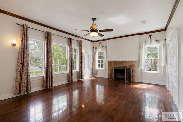 unfurnished living room featuring baseboards, a brick fireplace, ornamental molding, and hardwood / wood-style flooring