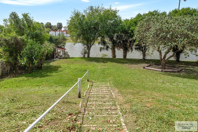 view of yard with a water view