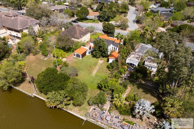 bird's eye view featuring a residential view and a water view