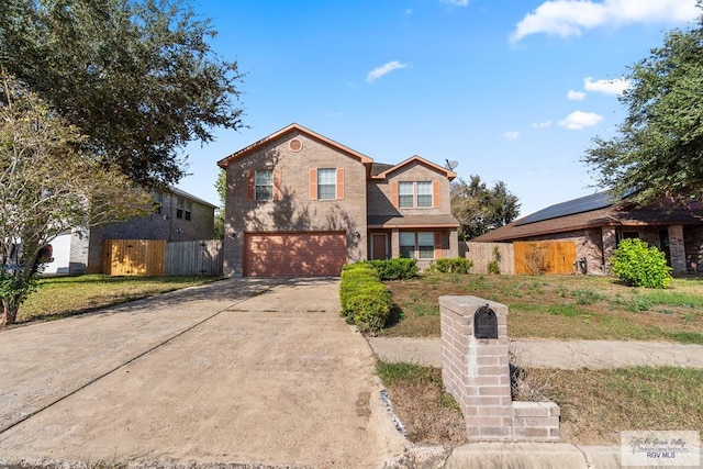 front of property with a garage