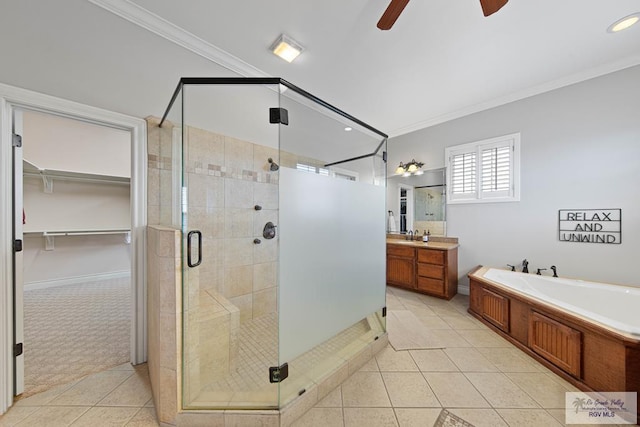 bathroom with vanity, tile patterned flooring, ceiling fan, separate shower and tub, and ornamental molding