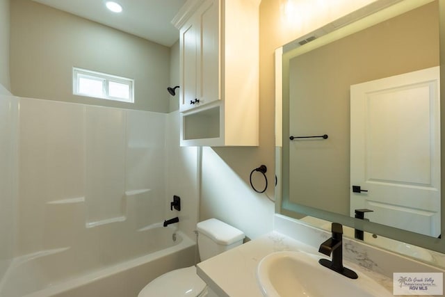 full bathroom with toilet, visible vents, shower / bathing tub combination, and vanity