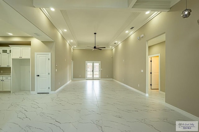 unfurnished room featuring marble finish floor, baseboards, a ceiling fan, and french doors